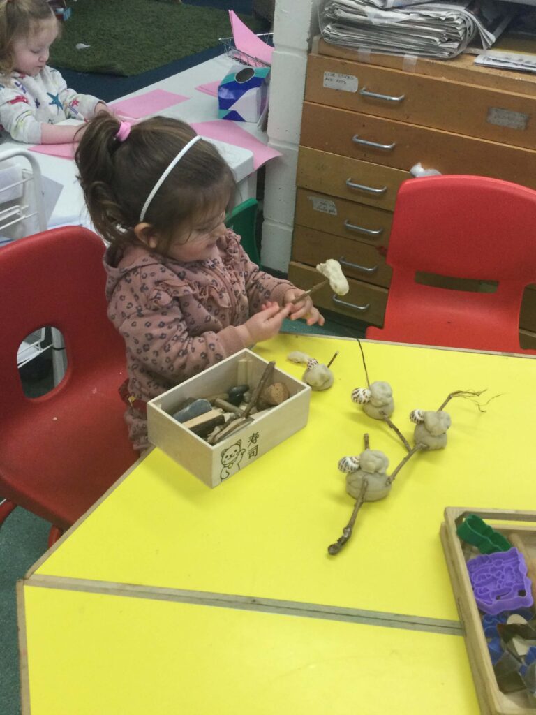A child playing at Alton College Nursery in Alton, Guildford